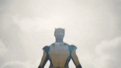 Man In Yellow And Black X-Men Costume GIF