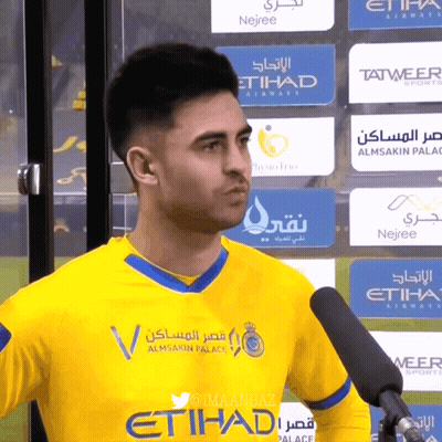 Man In Yellow And Blue Etihad Jersey GIF