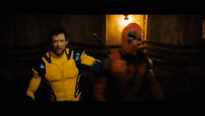 Man In Yellow And Blue Superhero Costume Says Foye Papi GIF