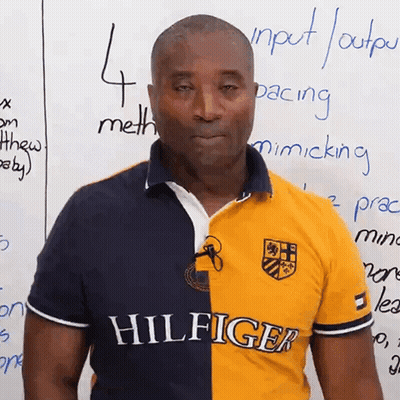 Man In Yellow And Blue Tommy Hilfiger Shirt GIF