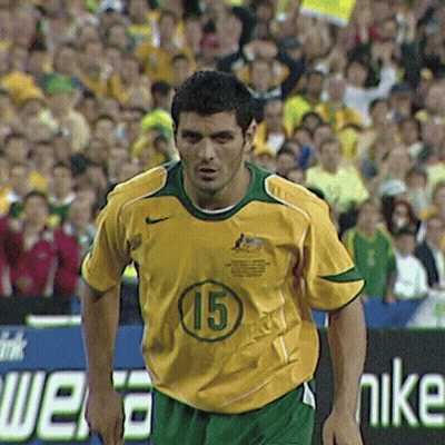 Man In Yellow And Green Nike Jersey Number 15 GIF