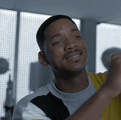 Man In Yellow And White Shirt Smiling GIF