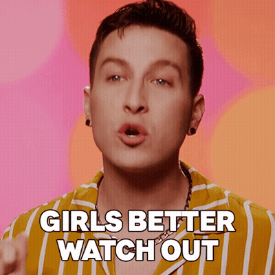 Man In Yellow And White Striped Shirt Saying Girls Better Watch Out GIF