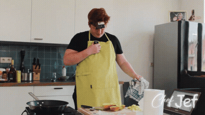 Man In Yellow Apron Cooking In Kitchen Chef Jef GIF