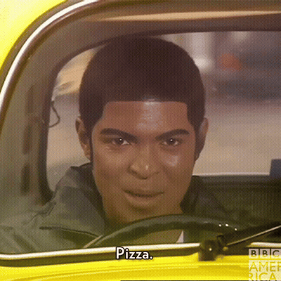Man In Yellow Car With Pizza GIF