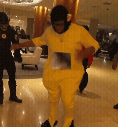 Man In Yellow Costume Dancing GIF