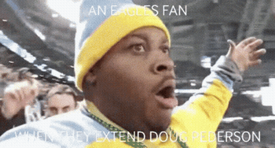 Man In Yellow Hat And Blue Beanie Eagles Fan Doug Peterson GIF