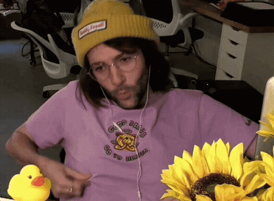 Man In Yellow Hat And Purple Shirt Saying Good Bears GIF