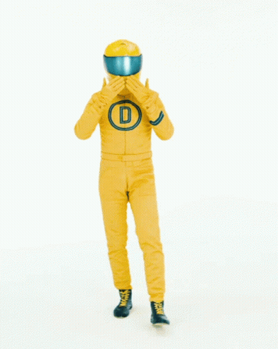 Man in Yellow Helmet in Front of Thank You Message