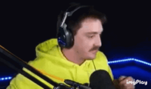Man In Yellow Hoodie Playing Video Game GIF