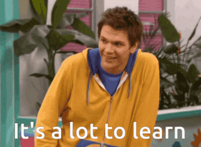 Man In Yellow Hoodie Smiling It's A Lot To Learn GIF