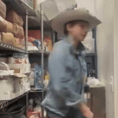 Man In Yellow Jacket And Blue Shirt GIF