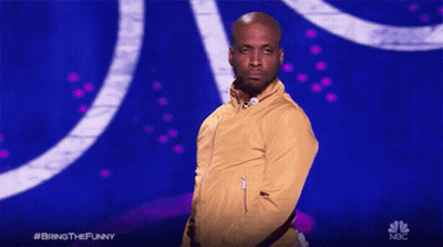 Man In Yellow Jacket At NBC Microphone GIF