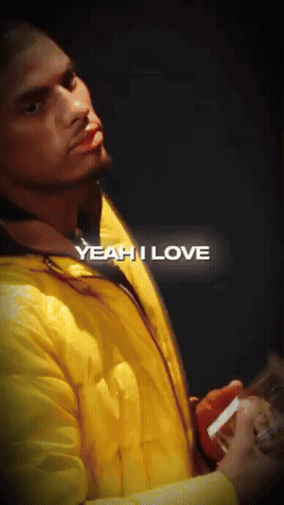 Man In Yellow Jacket Holding Cigarette Saying Yeah I Love GIF