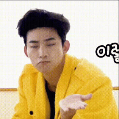 Man In Yellow Jacket Making Funny Face GIF