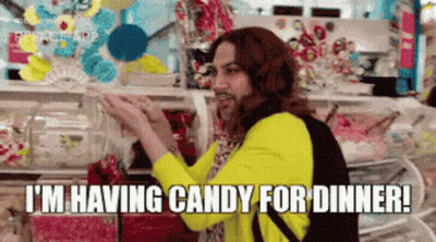 Man In Yellow Jacket Saying Having Candy For Dinner GIF