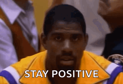 Man In Yellow Jacket Says Stay Positive GIF