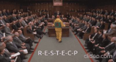 Man In Yellow Jacket Shaking Hands Saying Respect GIF