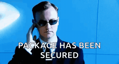 Man In Yellow Jacket Sitting In Green Car GIF