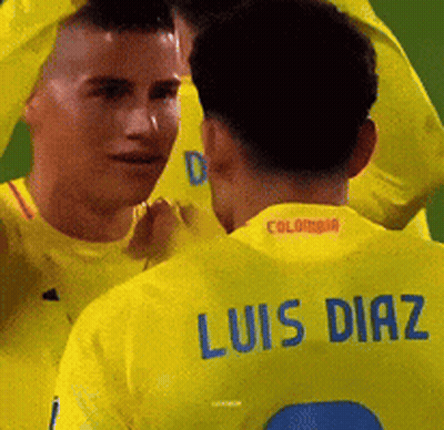Man In Yellow Jersey With Luis Diaz Name GIF