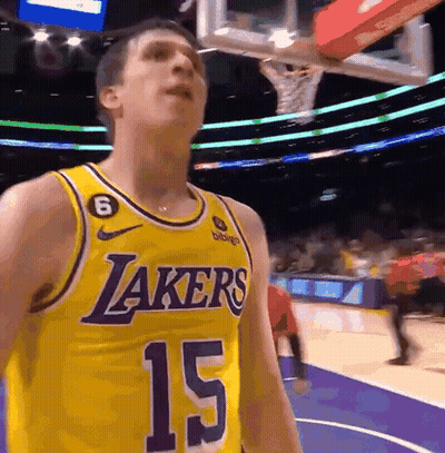 Man In Yellow Lakers Jersey Number 15 GIF