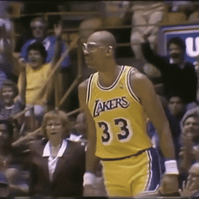 Man In Yellow Lakers Jersey Number 33 GIF