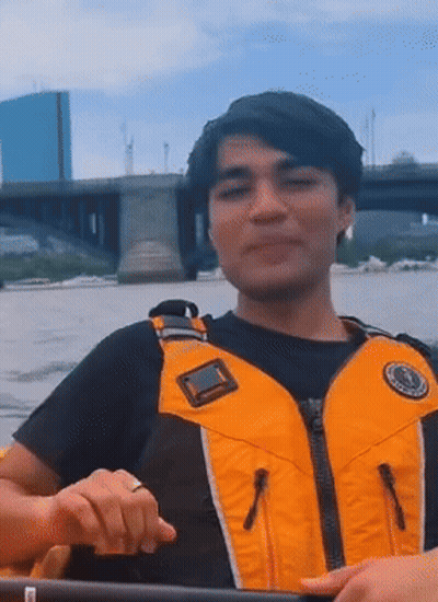 Man In Yellow Life Vest Rowing Kayak GIF