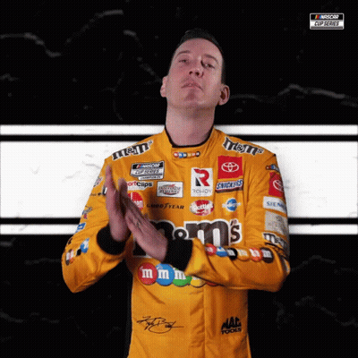 Man In Yellow M&M's Racing Uniform Applauds GIF