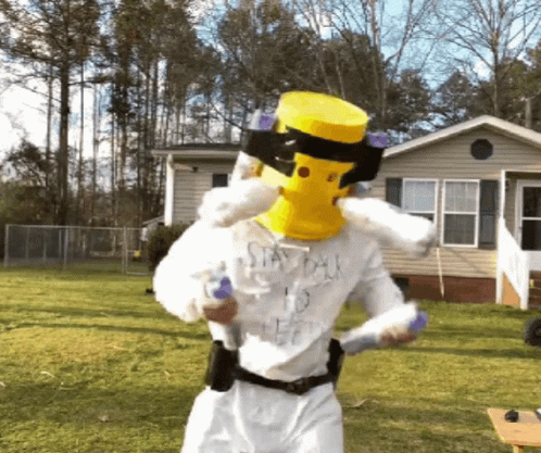 Man in Yellow Mask and Stay Back Shirt