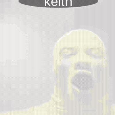 Man In Yellow Mask Yawning With Keith Above GIF