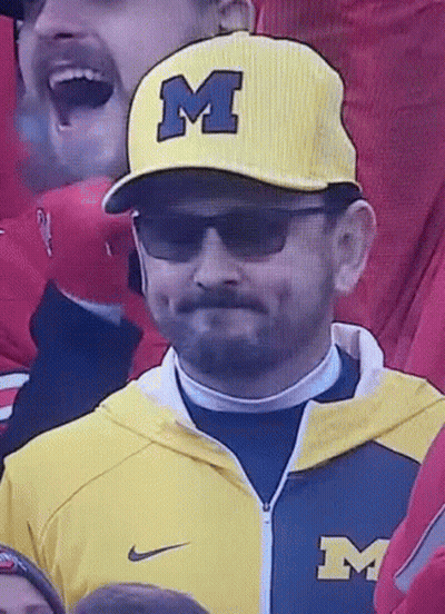 Man In Yellow Michigan Hat And Sunglasses GIF