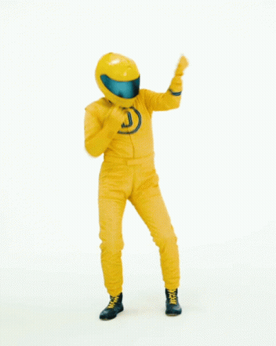 Man In Yellow Racing Suit Dancing Oh Yeah GIF