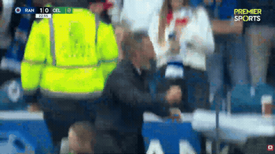 Man In Yellow Safety Vest Watching Soccer GIF