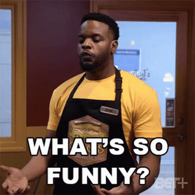 Man In Yellow Shirt And Apron Saying What's So Funny GIF
