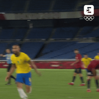 Man In Yellow Shirt And Blue Shorts Running GIF