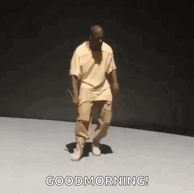 Man In Yellow Shirt And Khaki Pants Dances Good Morning GIF