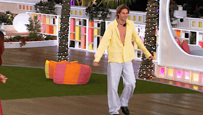 Man In Yellow Shirt And White Pants Dancing GIF