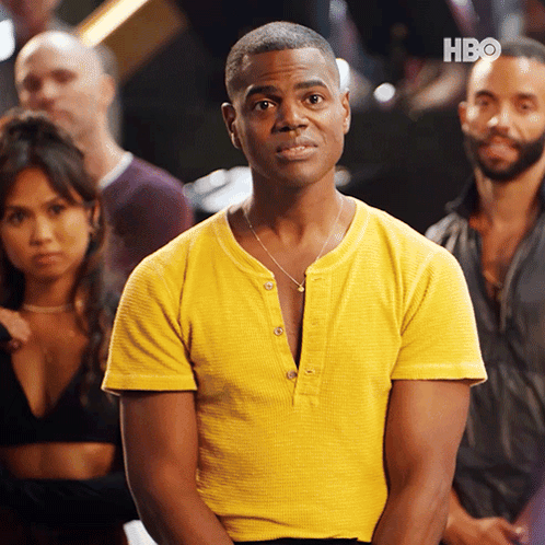 Man In Yellow Shirt Before Group With HBO GIF