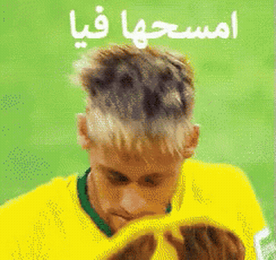 Man in Yellow Shirt Covering Face