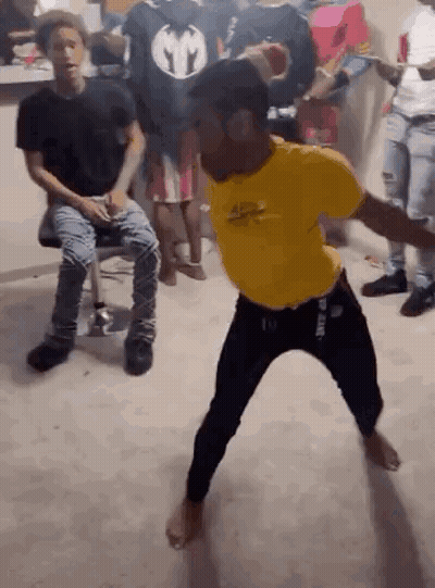 Man In Yellow Shirt Dancing GIF