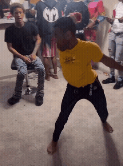 Man In Yellow Shirt Dancing GIF