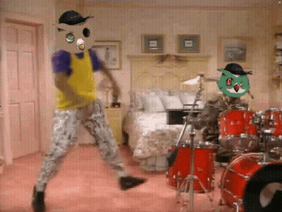 Man In Yellow Shirt Dancing In Front Of Drum Set GIF