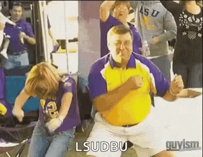 Man In Yellow Shirt Dancing With Woman In Purple Shirt Lsudbu GIF