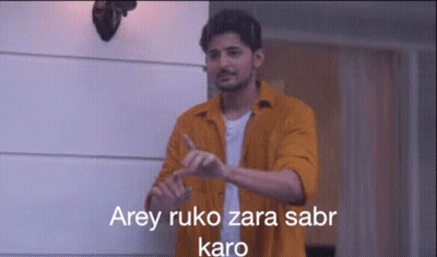 Man In Yellow Shirt Gesturing Arey Ruko Zara Sabr Karo GIF