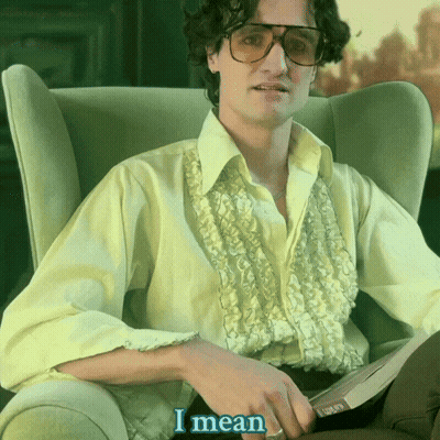 Man In Yellow Shirt Holding Book Saying I Mean GIF