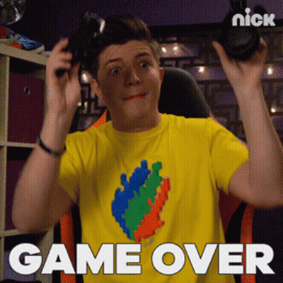 Man In Yellow Shirt Holding Controller Game Over GIF
