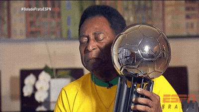 Man In Yellow Shirt Holding Trophy With ESPN Logo GIF