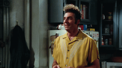 Man In Yellow Shirt In Front Of Fridge With Lucky Charms GIF