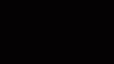Man In Yellow Shirt Laying On Bed With Purple Pillows GIF
