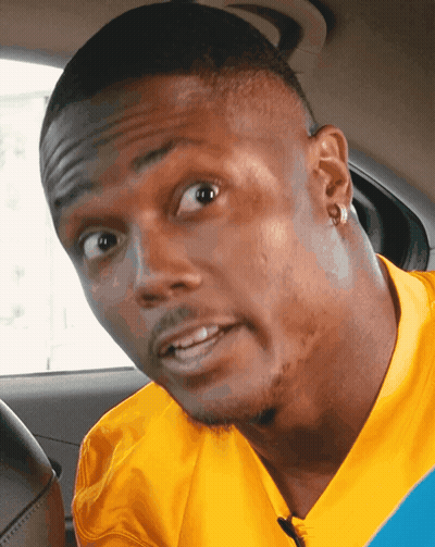 Man In Yellow Shirt Making A Face GIF